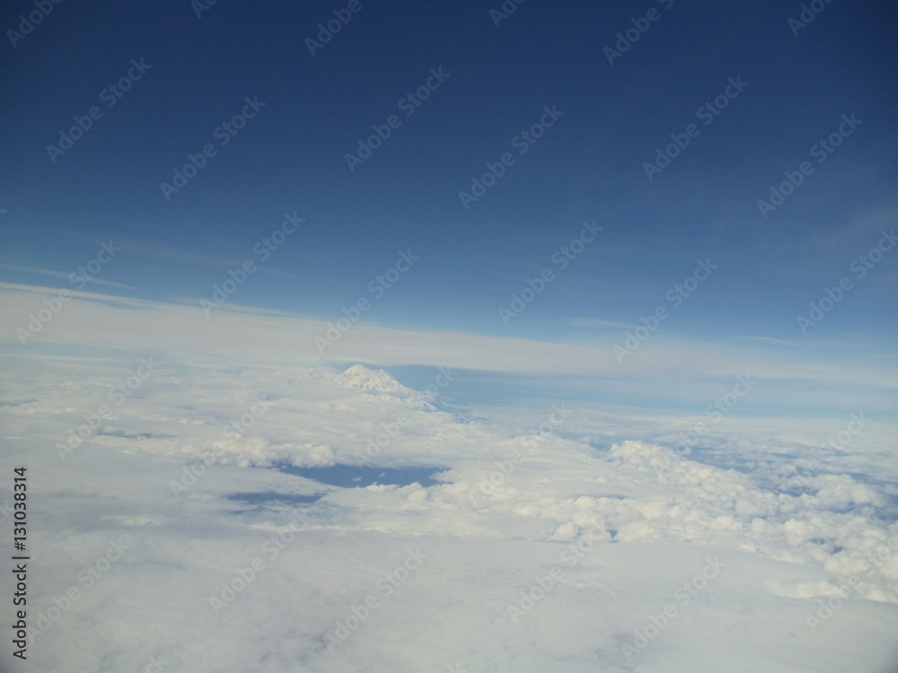 Naklejka premium Above the clouds