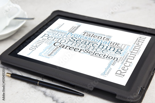 tablet with consulting word cloud