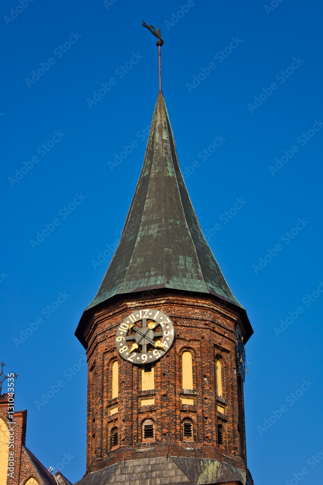Clock Tower with vane at Cathedral in Kaliningrad Clock Tower with vane at Cathedral in Kaliningrad
