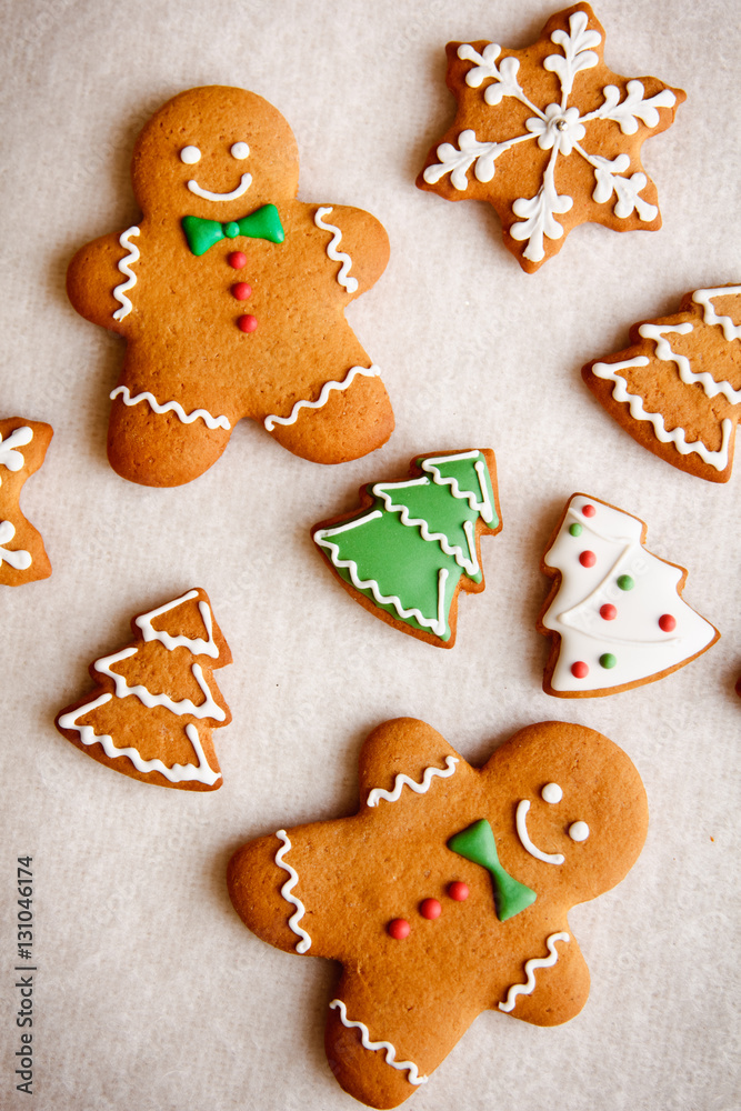 beautiful Christmas background with gingerbread men, Christmas trees and snowflakes with pine cones beautiful Christmas background with gingerbread men, Christmas trees and snowflakes with pine cones