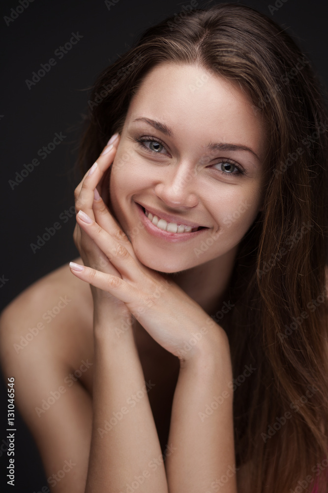 Young smiling woman with beautiful healthy face Young smiling woman with beautiful healthy face