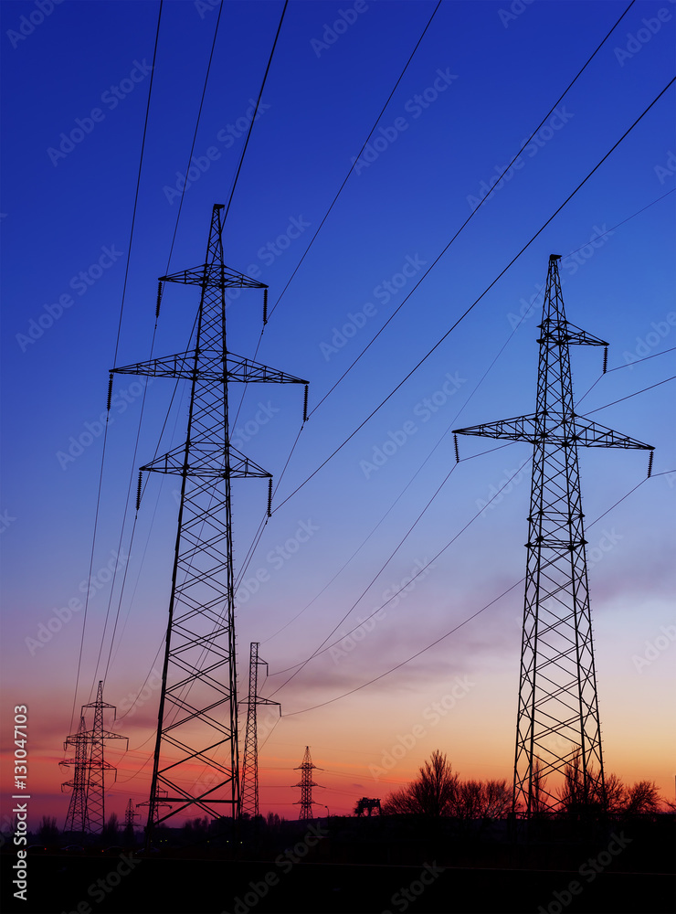 silhouette of high voltage electrical pole structure.