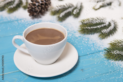 coffee on blue table and christmas background