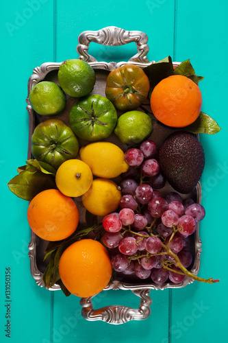 Fototapeta Naklejka Na Ścianę i Meble -  Green and purple fresh juices or smoothies with fruit, greens, v
