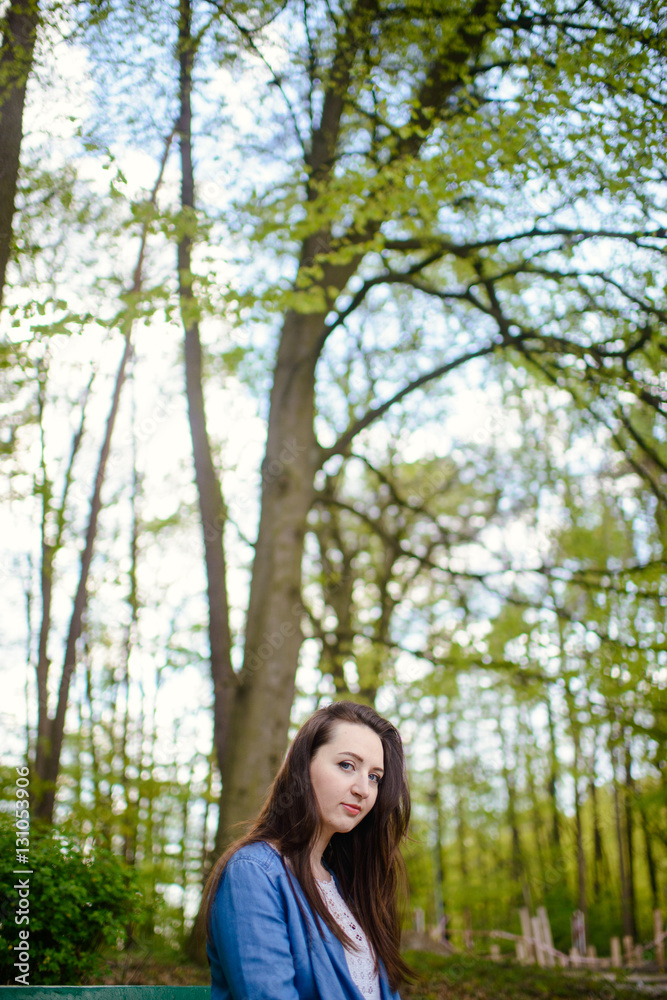 beautiful girl in a dress in the spring in a mask of dry leaf beautiful girl in a dress in the spring in a mask of dry leaf