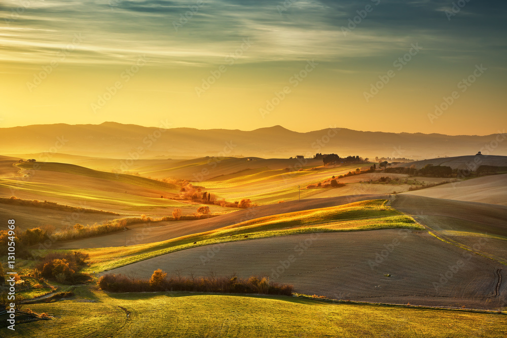 Tuscany countryside misty panorama, hills and fields Italy