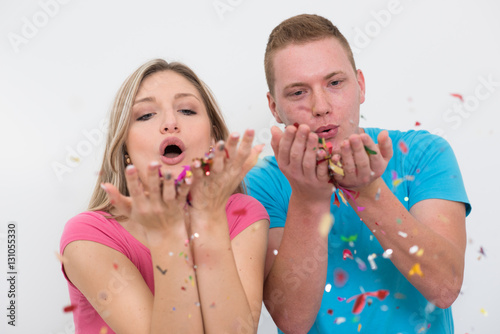 romantic young  couple celebrating  party with confetti