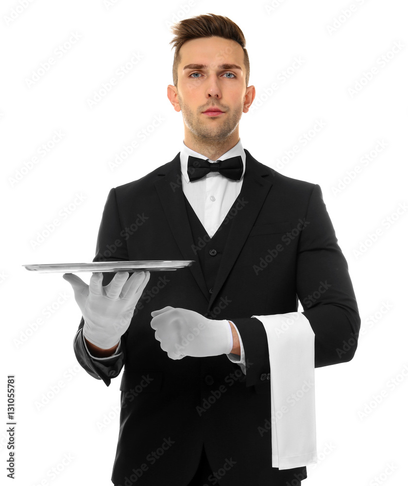 Handsome young waiter with metal tray on white background StockFoto