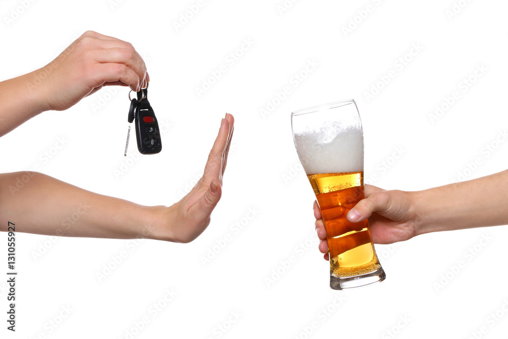 Woman with car key refusing glass of beer, on white background. Don't drink and drive concept Woman with car key refusing glass of beer, on white background. Don't drink and drive concept