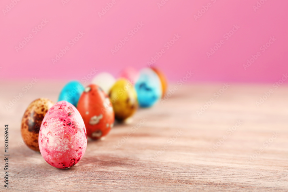 Colorful Easter eggs on wooden table Colorful Easter eggs on wooden table