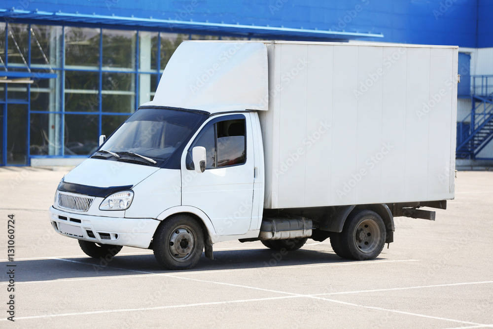 Fototapeta premium Side view of white cargo car