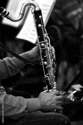 Canvas Print Hands musician playing bass clarinet in black and white