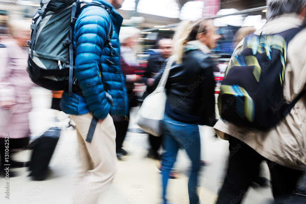 Fototapeta premium people at the station in motion blur