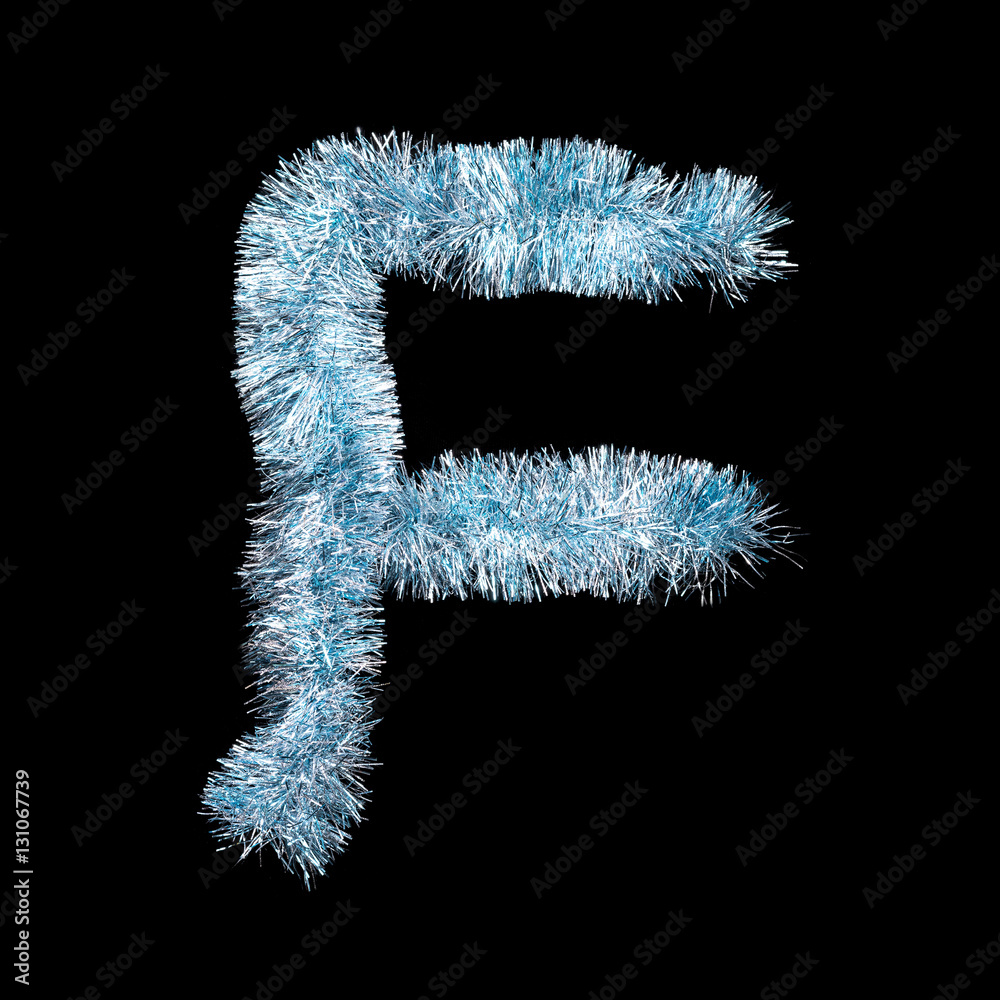 Festive alphabet made of blue tinsel. Letter F on black background. Isolated Festive alphabet made of blue tinsel. Letter F on black background. Isolated