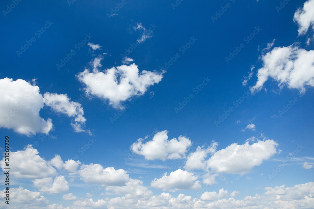 Obraz premium white fluffy clouds in the blue sky