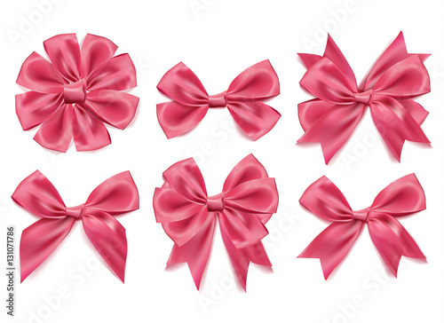 Vector 3d realistic ribbon shaped pink bows set. isolated background