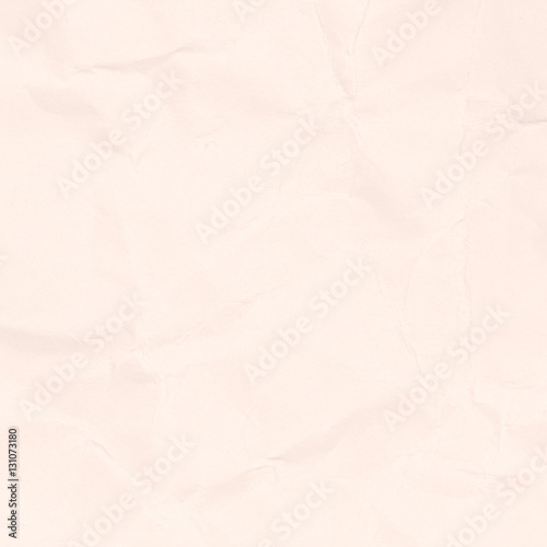 Recycled crumpled light brown paper texture or paper background. Closeup light brown paper detail for design with copy space for text or image.