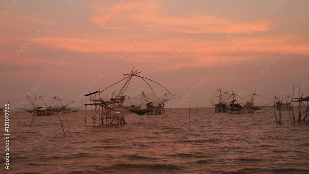 Landscape of square dip net or Yo(Thai language) in evening at Pakpra, Phatthalung, Thailand. Landscape of square dip net or Yo(Thai language) in evening at Pakpra, Phatthalung, Thailand.