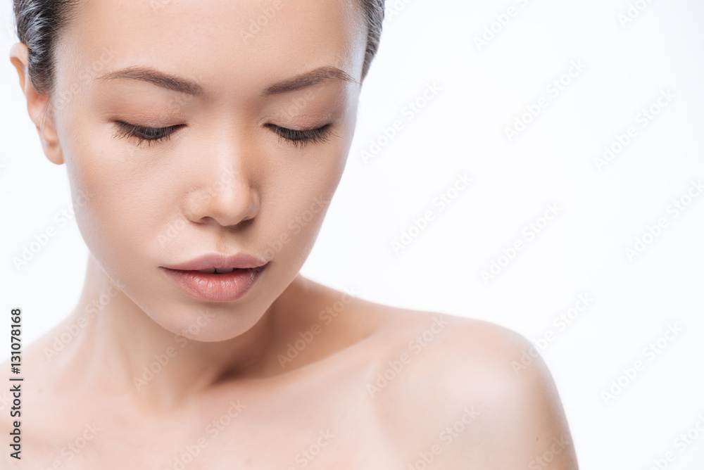 Beautiful young Korean woman expressing emotions in the studio Beautiful young Korean woman expressing emotions in the studio
