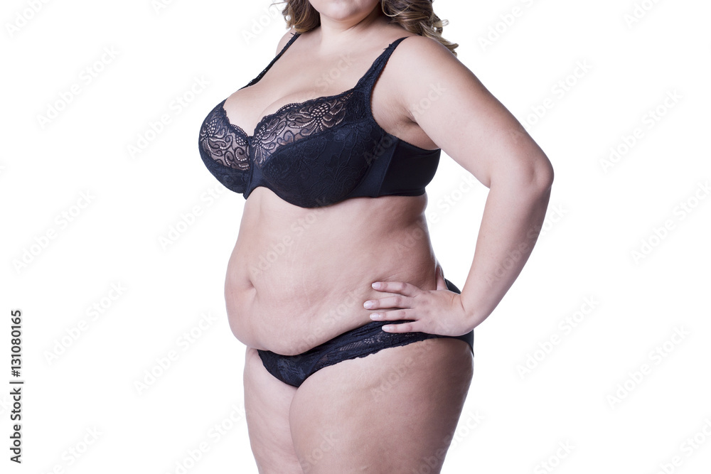 Plus size model in black lingerie, overweight female body, fat woman with  stretch marks isolated on white background Stock Photo | Adobe Stock
