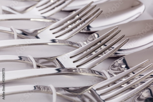 Close up macro detail of a flatware box set with forks and spoons.