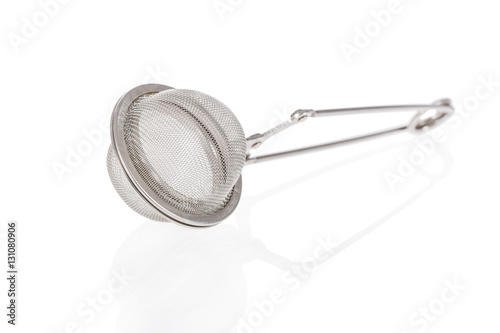 Tea infuser isolated on a white background photo