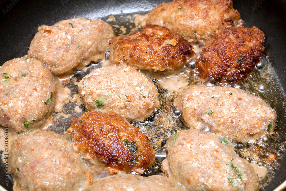 cutlets fried in a pan cutlets fried in a pan