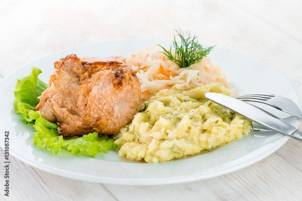 Russian homemade dish: mashed potatoes, chicken and cabbage sala Russian homemade dish: mashed potatoes, chicken and cabbage sala