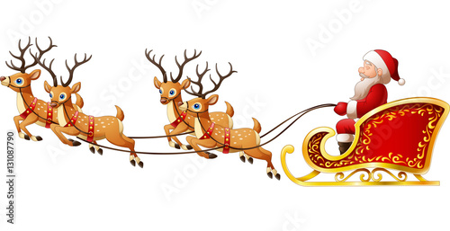 Santa Claus rides reindeer sleigh on Christmas photo