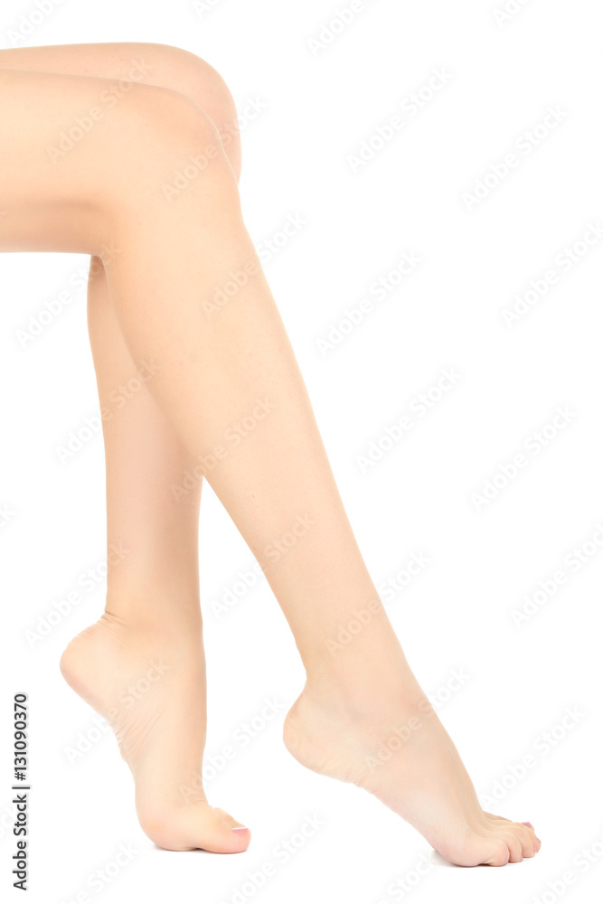Beautiful female legs isolated on a white background. Beautiful female legs isolated on a white background.