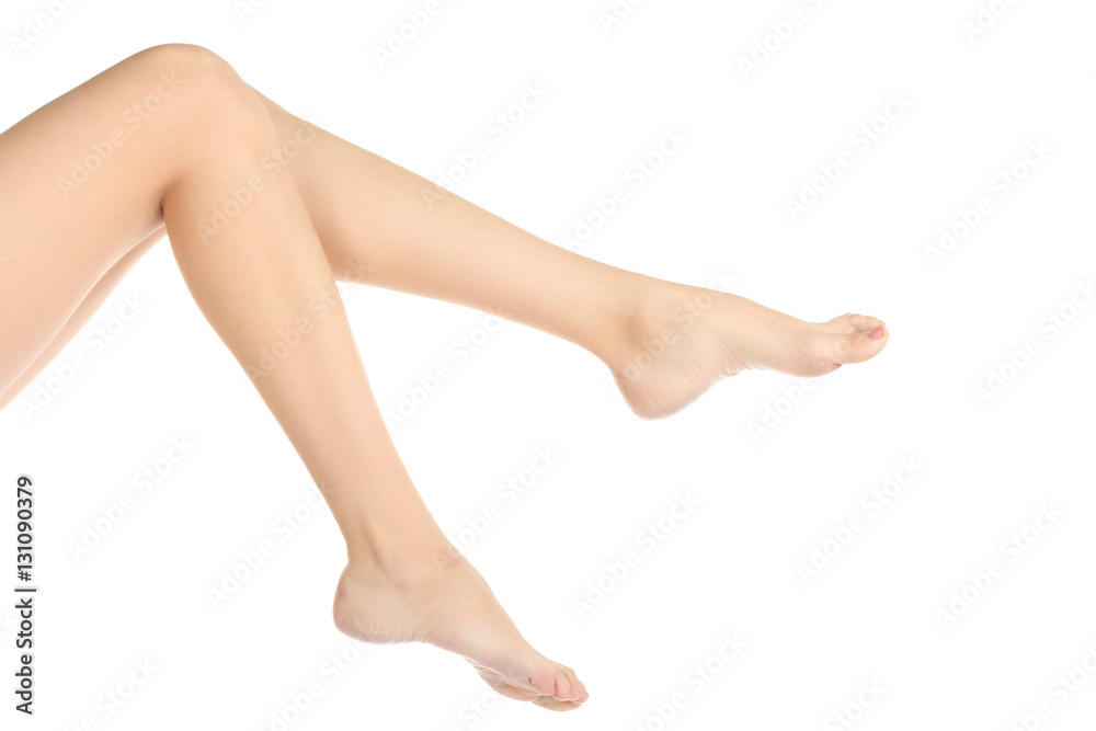 Beautiful female legs isolated on a white background. Beautiful female legs isolated on a white background.