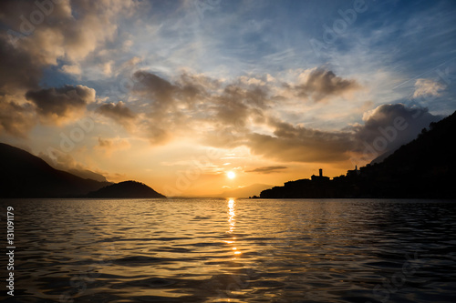 Sun setting on Lake Iseo in Italy © patronestaff