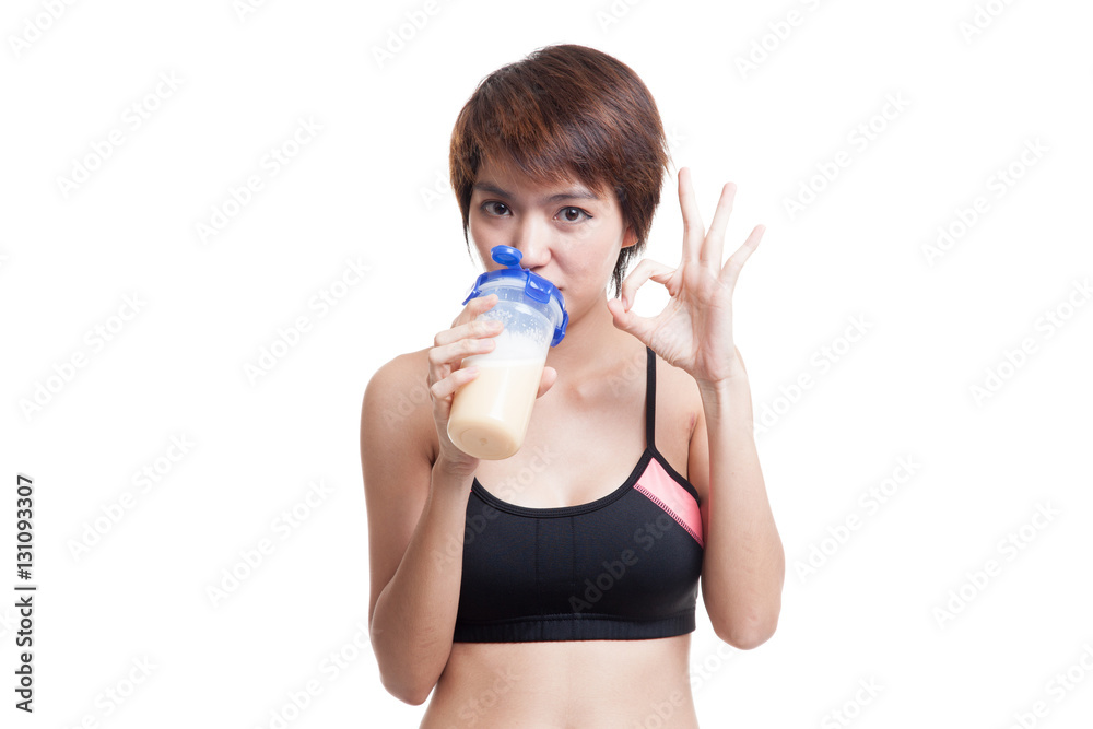 Beautiful Asian healthy girl show OK drink whey protein. Beautiful Asian healthy girl show OK drink whey protein.