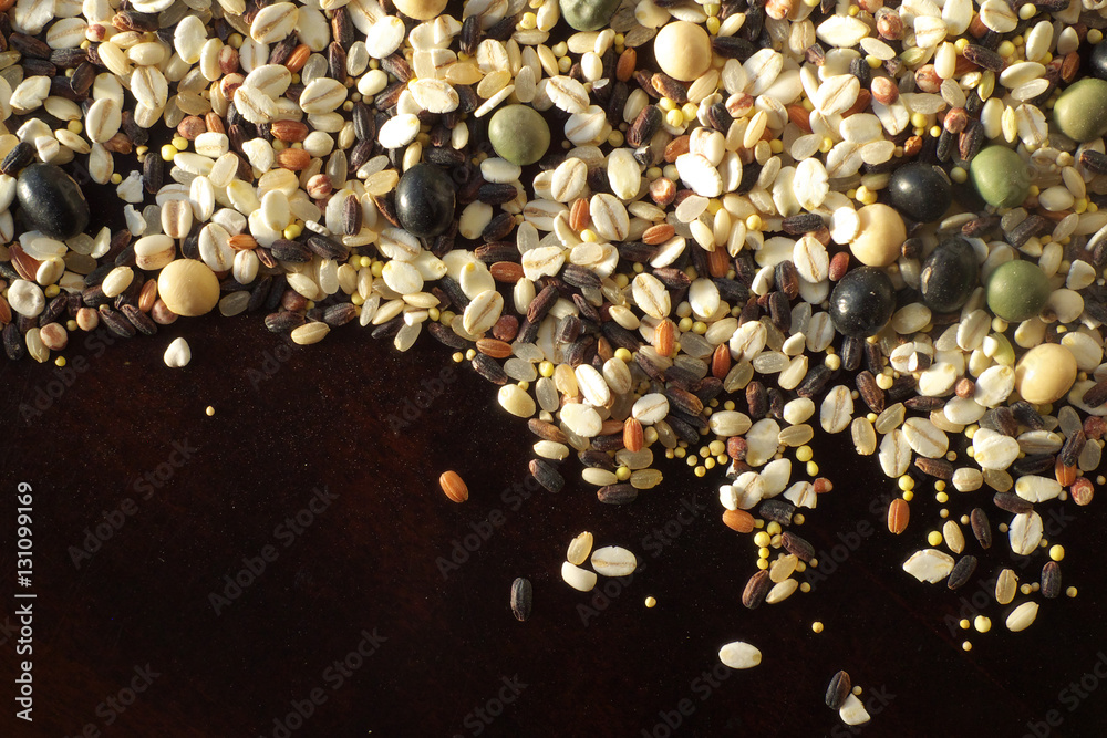 Fototapeta premium Cereals and beans on wood background