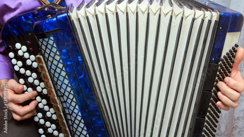 A man playing the accordion