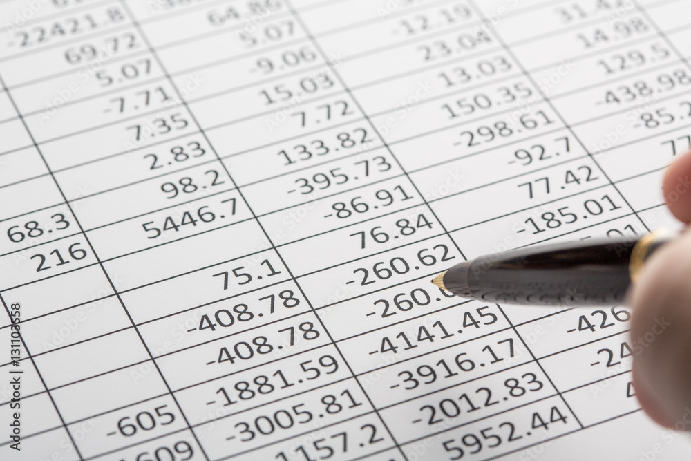 Close up of finance business sheet with pen Close up of finance business sheet with pen