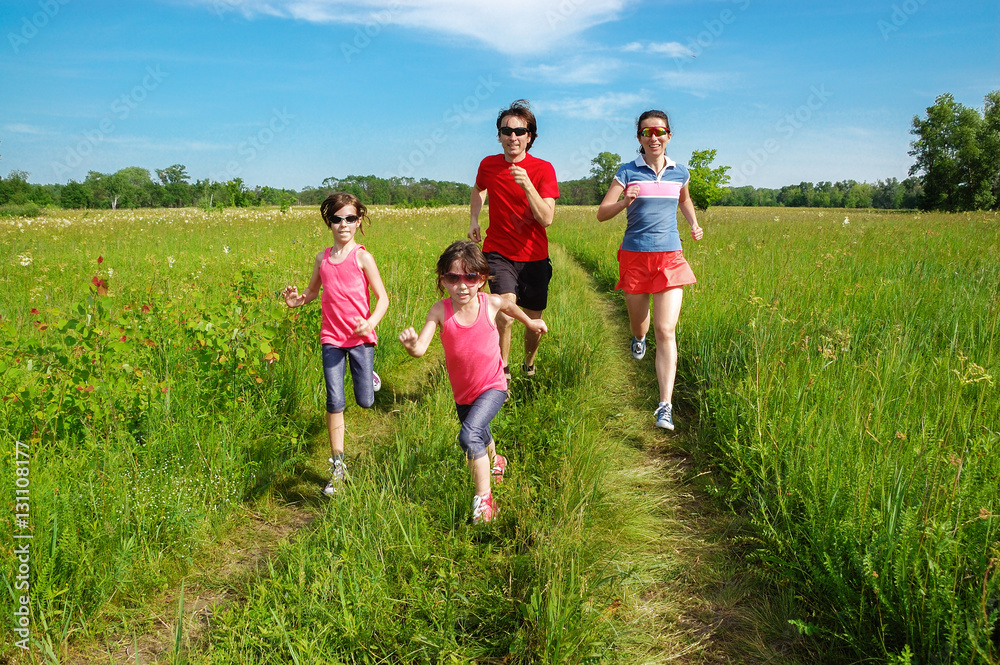 Family fitness outdoors, parents with kids jogging in park, running and healthy lifestyle
