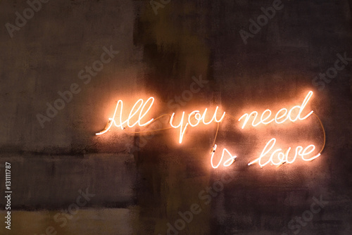 neon sign of love on vintage wall