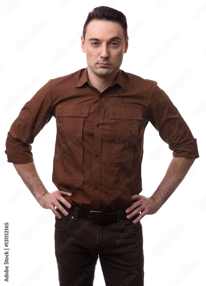Serious man with hand on hips Serious man with hand on hips