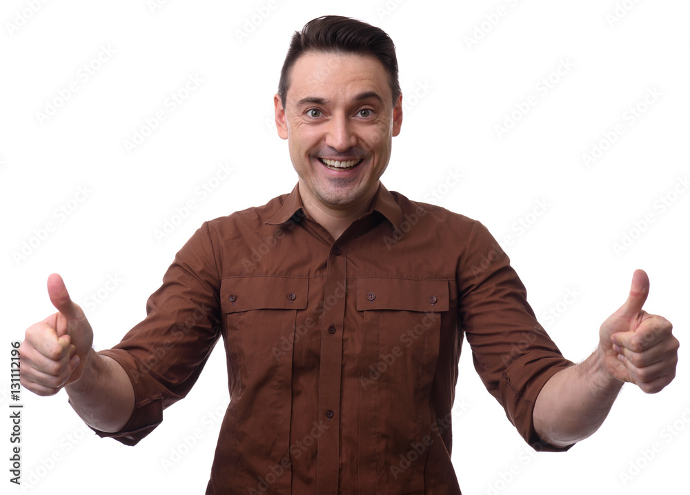 Fototapeta premium Happy handsome man showing thumbs up