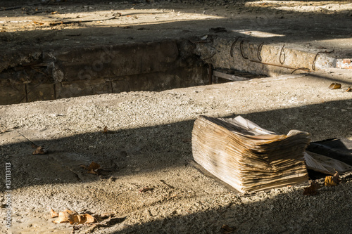 open old book in an abandoned factory photo