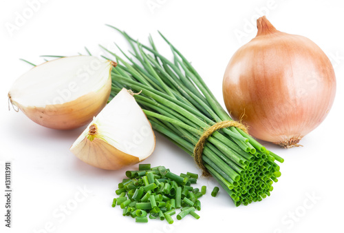 Green onions and bulb onion isolated on the white background.
