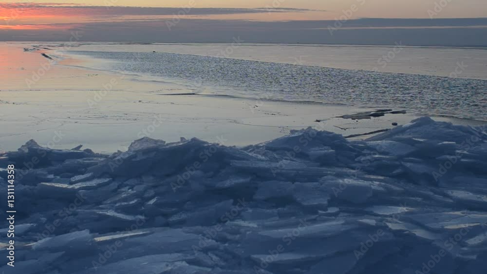 Movement of new ice.	Sunset over the freezing sea
