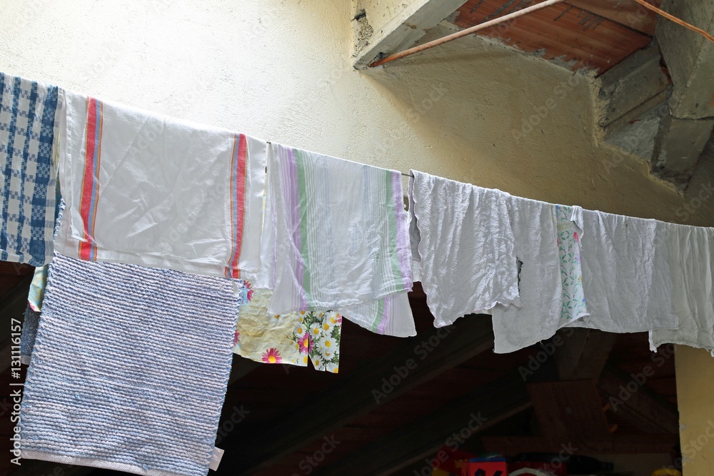 clothes hanging in the attic clothes hanging in the attic