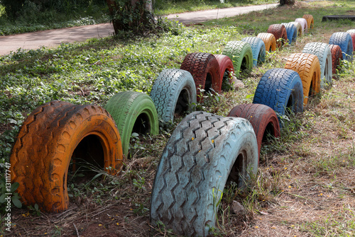 Coloured old tires in the playground