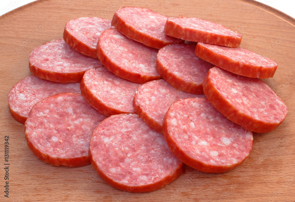 Sliced pieces of smoked salami sausage Sliced pieces of smoked salami sausage