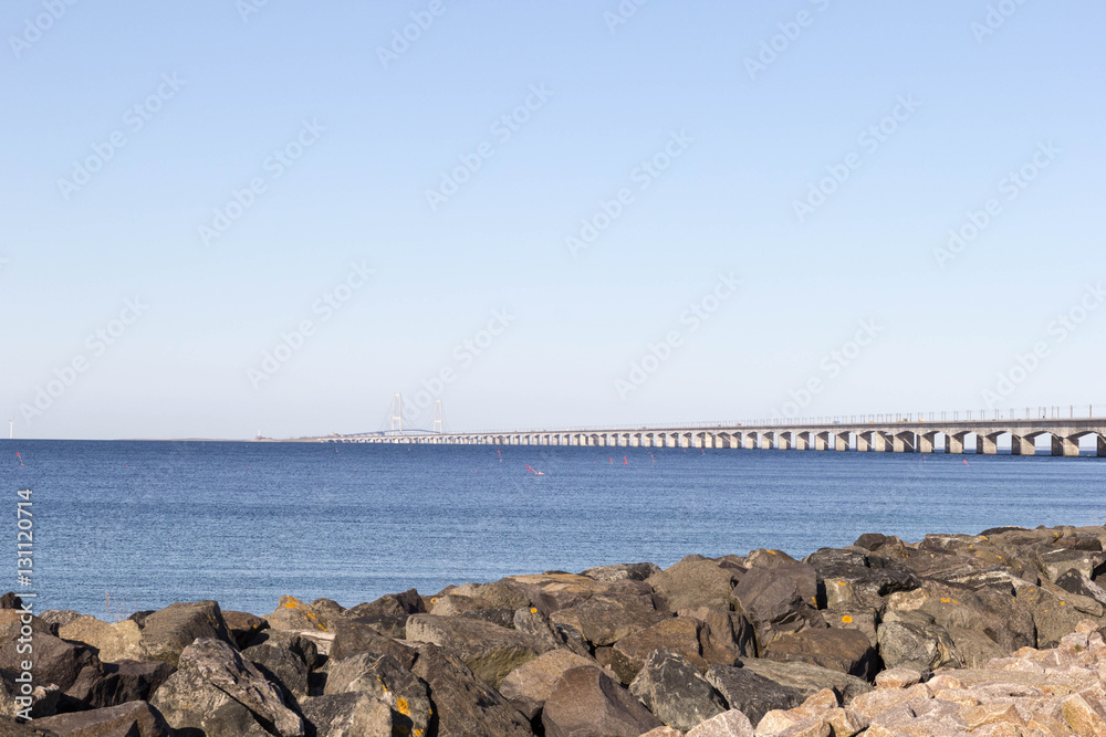 The sea shore overlooking the long white bridge
