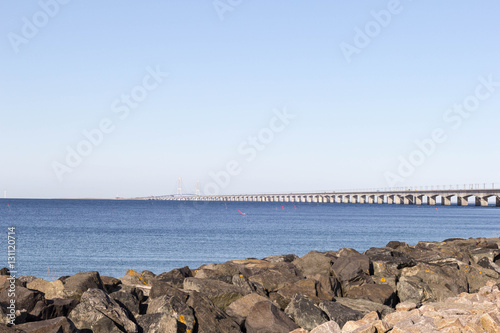 The sea shore overlooking the long white bridge