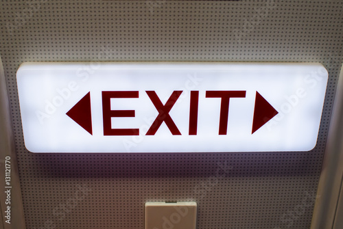 Emergency exit sign in a commercial airplane.