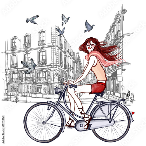 woman riding a bicycle in Paris